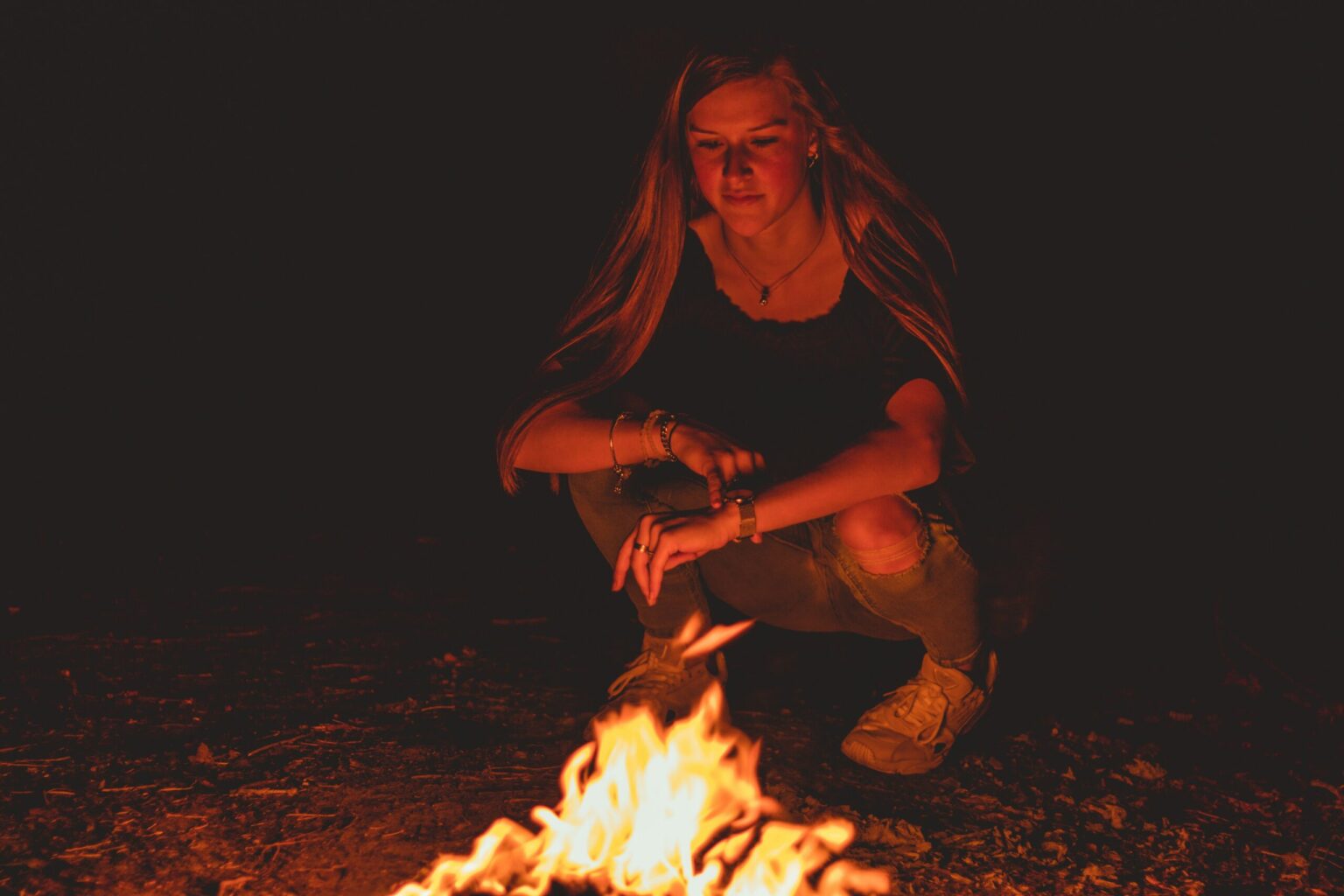 Person next to campfire: Thermal comfort concept